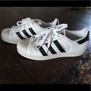 White with black stripes superstar adidas sneakers